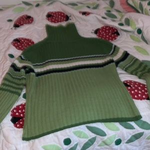 Green turtleneck sweater
